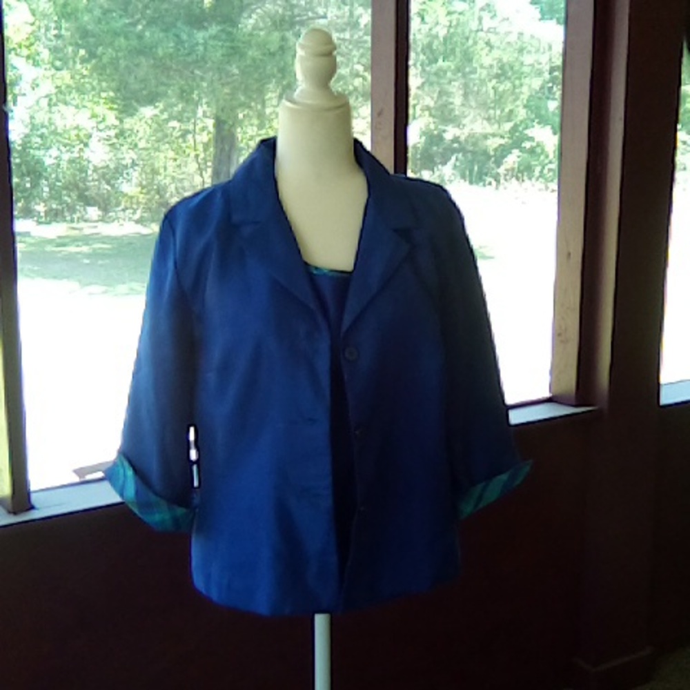 Blue and light green shirt and jacket size 14.
